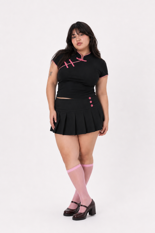 FALDA BOTONES ROSADOS